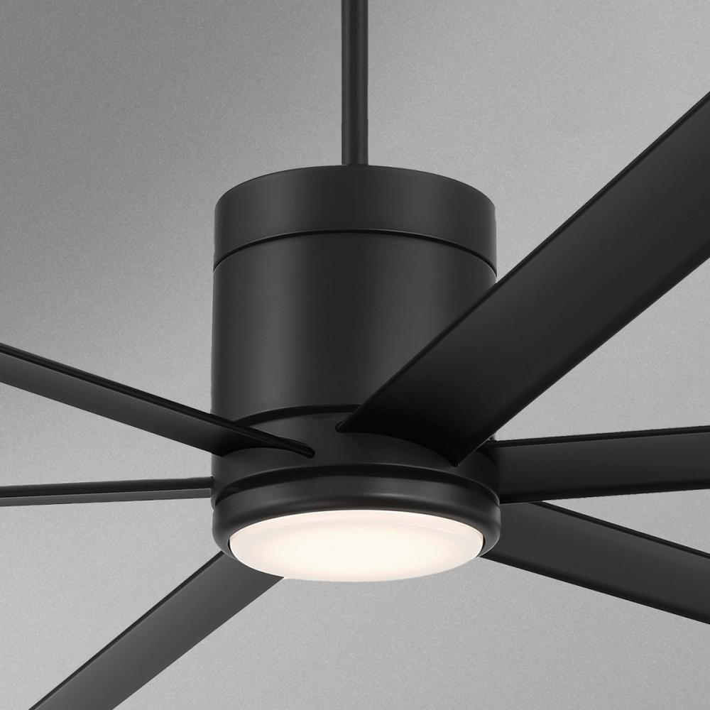 close up of black ceiling fan on a gray background