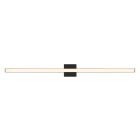 The Trim - 10148 is a sleek, minimalist wall sconce with an elongated white light panel and a central black base. Its modern design features dimmable LED lighting for versatile indoor use and meets ADA compliance standards.