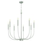 Elevate your space with the Traci - 59828 chandelier, featuring a sleek modern silver design. Its eight graceful arms hold candle-shaped LED bulbs, suspended from a circular ceiling plate, creating an exquisite touch of elegance and sophistication for any