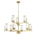 The Whittley - 60129-SB gold chandelier has a sleek central rod with four arms, each holding two ribbed glass shades. Positioned symmetrically and hanging from a gold chain, its perfect for adding modern sophistication to any space.