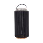 The Sea Scape - 86297SS-OTR is a modern solar outdoor lantern with a black ribbed cylindrical exterior, silver top, and black handle. Its base looks wood or wood-like, ideal for patio lighting and enhancing outdoor areas.