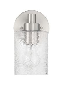 Discover the Craftmade Lyndsey - 60201 wall sconce in brushed nickel, featuring a cylindrical design, round backplate, and textured glass shade. Its clear glass shades bring a modern touch to elevate any contemporary space.