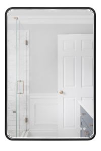 The Monica LED Lighted Mirror – MIR2403RRT, with its rectangular shape and black frame, enhances the modern bathroom by reflecting a bright light temperature. Visible are the glass shower door with a brass handle, gray walls, and a white and blue vanity c